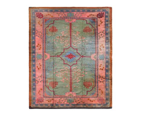 Gavin Morton for Alexander Morton &amp; Co., An Arts &amp; Crafts Donegal Carpet, circa 1900, the emerald green field decorat