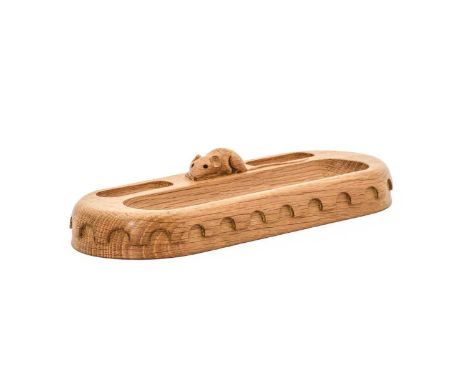 Workshop of Robert Mouseman Thompson (Kilburn): An English Oak Pen Tray, oblong with penny moulding, three sections, with car