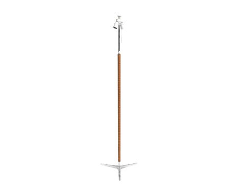 A 1970s Kaiser Leuchten Floor Lamp, tan leather wrapped column, pull cord switch, two white sockets, on a cast aluminium trip