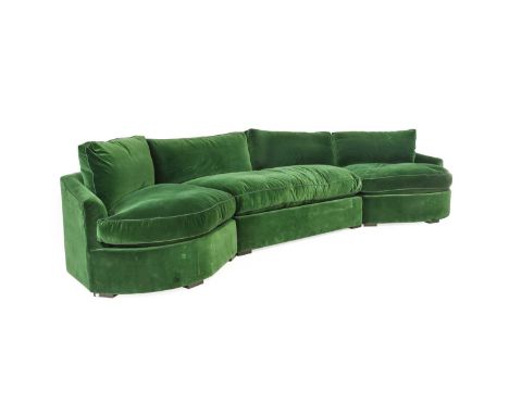 Sibyl Colefax and John Fowler: A Modular Three Piece Bay Window Sofa, modern, upholstered in bottle green cotton velvet, roun