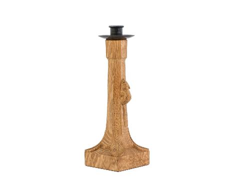 Workshop of Robert Mouseman Thompson (Kilburn): An English Oak Candlestick, with wrought iron sconce, octagonal column, on a 