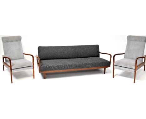 GREAVES &amp; THOMAS; a mid-20th century retro teak framed three-piece lounge set comprising three-seater fold-out sofa bed, 