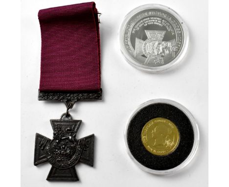 A Bradford Exchange 'The Victoria Cross Gold and Silver Commemorative Set' comprising a replica Victoria Cross Medal, a sterl