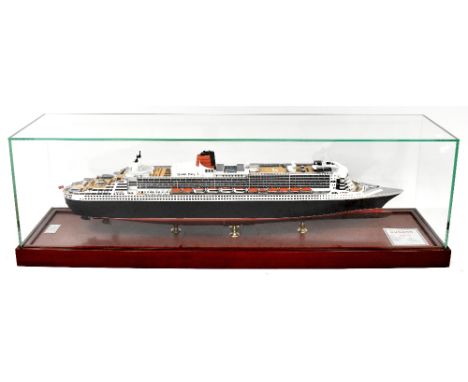 RMS 'QUEEN MARY 2'; a fine scale model in glazed case on wooden plinth, the first plaque inscribed 'Modelltechnik Hamburg Sch