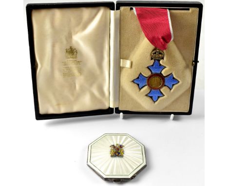 A 'Commander of the Order of the British Empire' (CBE) enamelled medal, with red and ivory silk neck ribbon, in original velv