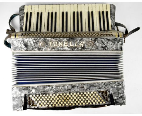 A vintage cased accordion.