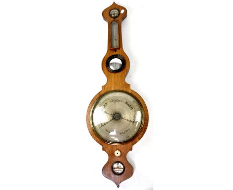 An early 20th century Winterhalder of Leicester oak wall hanging barometer and thermometer, the silvered dial with black scri
