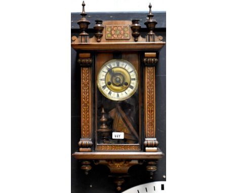 A late 19th century inlaid regulator wall clock of architectural form, the enamelled white chapter ring set with Roman numera