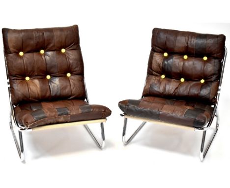 A pair of mid-20th century retro low lounge chairs with button pressed brown leather pads over a chrome tubular frame (2). CO