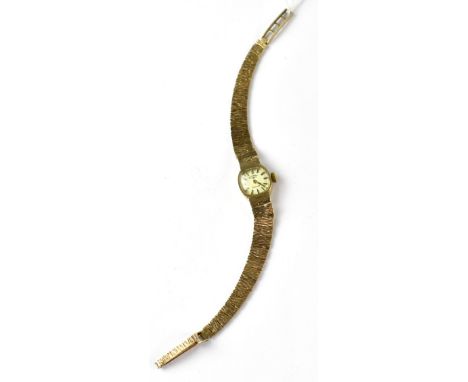 ROTARY; a ladies' 9ct gold wristwatch with 21-jewel crown wind movement, the square silvered dial set with raised gold baton 