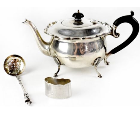 A George V hallmarked silver teapot, Joseph Gloster Ltd, Birmingham 1920, a Victorian hallmarked silver serving spoon, Sheffi