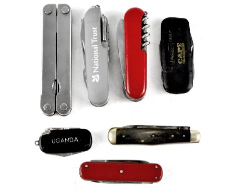 Six various penknives/Swiss Army knives and a multitool (7).