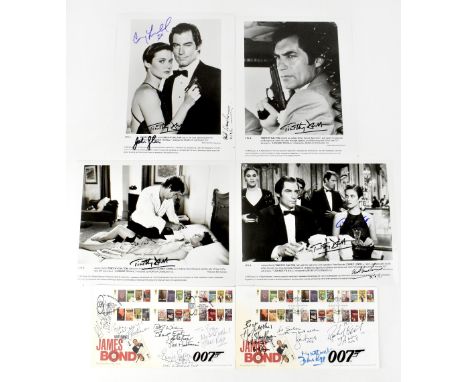 TV AND FILM, JAMES BOND; four black and white promotional photographs bearing the signature of Timothy Dalton, from the film 