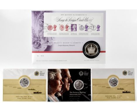 A Royal Mail 'HM Queen Elizabeth II Longest Reigning Monarch 1952-2015' silver proof coin and stamp cover numbered 474, with 