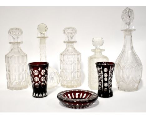 Two Bohemian ruby flash glass vases, height of each approx 13cm, a similar small bowl and five Victorian glass decanters (8).