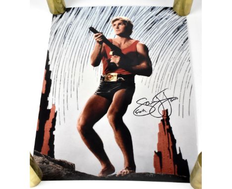 TV AND FILM, 'FLASH GORDON'; four rolled colour photographs bearing signatures of stars from the film (4). CONDITION REPORT T