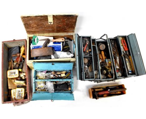 Two WWII ammunition boxes containing a large collection of vintage tools to include bit and brace, wooden planes, clamps, scr