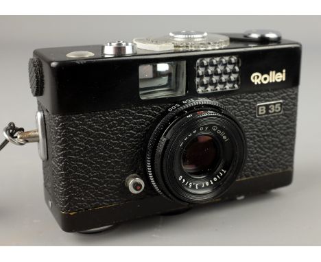 Rollei B35 Compact Camera with Zeiss Triotar 3,5/40 lens, carry case and Rollei promo poster   Condition Report   Click here 