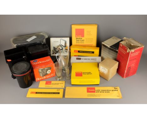 Graduated set of three glass measures, two Kodak Thermometers, colour Separation guides, Test Cards, Tray Siphon, Masking Boa