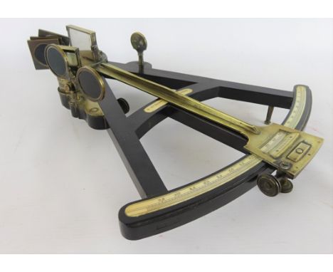 19th century brass & ebony octant by D McGregor Glasgow & Greenock, the graduated arc with ivory scale, index & horizon mirro