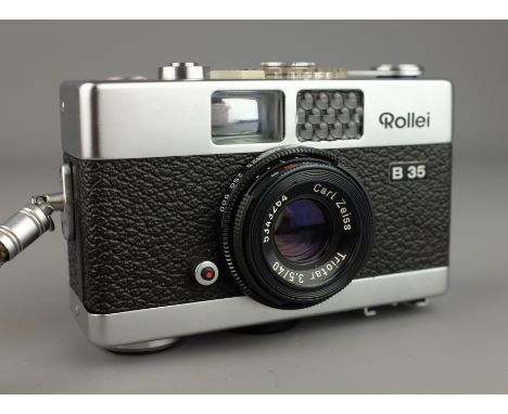 Rollei B35 Compact Camera with Zeiss Triotar 3,5/40 lens, Rollei Beta flash, carry case and instructions   Condition Report  