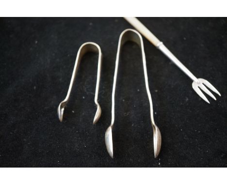 2 Silver sugar tongs &amp; a silver mother of pearl pickle fork 