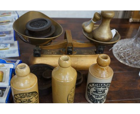 Balance scales &amp; weights together with vintage bottles 