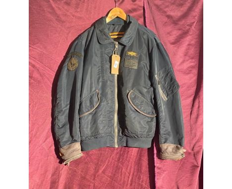 Schott Bros. Inc. Flitght Jacket with front zip, embroidered patch, and leather tag. Issue No. 1409-09-1. New York, 1913.  / 