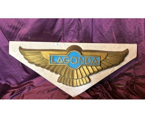 A fibreglass 'Lagonda' sign mounted on board, 112cm (w)  / All lots are located at The Barn, Hampstead Farm, Nr Henley on Tha