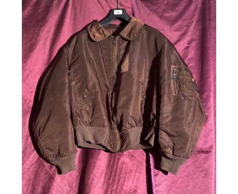 A vintage Alpha Industries brown flight jacket, labled as XL  / All lots are located at The Barn, Hampstead Farm, Nr Henley o