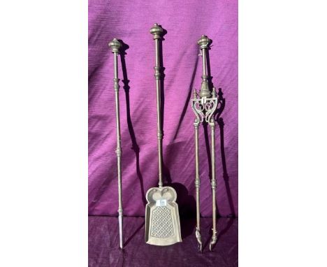 A set of three brass fire tools  / All lots are located at The Barn, Hampstead Farm, Nr Henley on Thames, Oxfordshire, RG9 4L