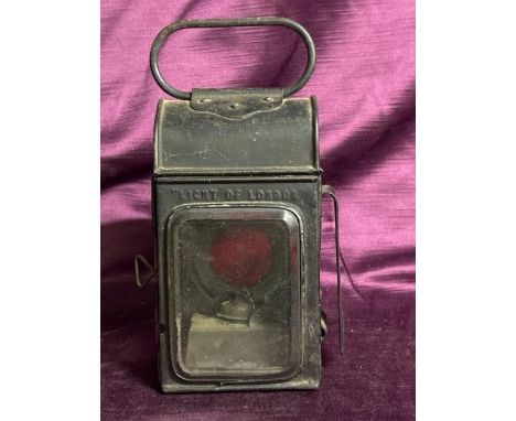 A vintage carriage lamp "Light of London". Meaures 18cm high  / All lots are located at The Barn, Hampstead Farm, Nr Henley o