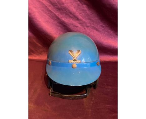 Vintage Centurion safety helmet, blue with brass rivets. Manufacturer's badge on front.  / All lots are located at The Barn, 