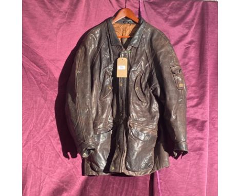 Vintage Redskins Paris brown leather jacket with multiple pockets, button closures, and distinctive branding.  / All lots are
