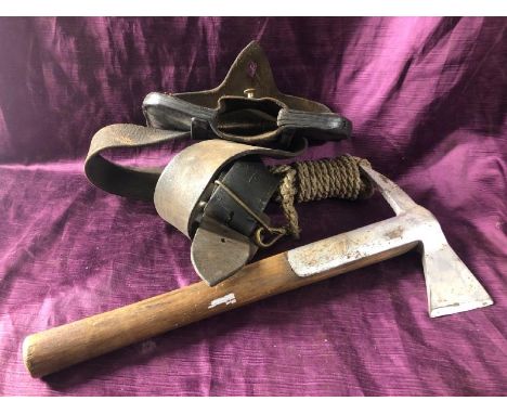 Early 20th century firemans axe with pouch, 38.5cm (l) x 18.5cm (w)  / All lots are located at The Barn, Hampstead Farm, Nr H