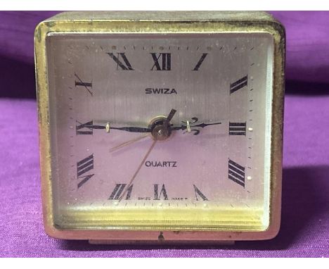 A vintage Swiza travel clock.   / All lots are located at The Barn, Hampstead Farm, Nr Henley on Thames, Oxfordshire, RG9 4LG