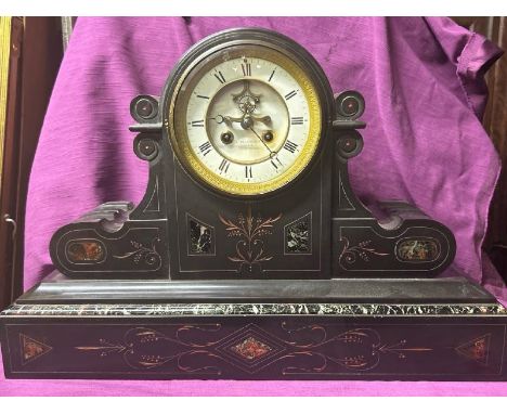 A black slate mantle clock by A. Everington of Paris with ornate marbling. No Key, no pendulum, untested. Measures 34 x 50 x 