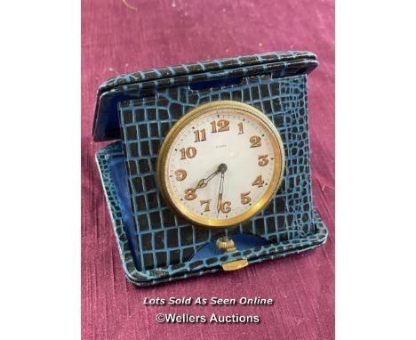 Vintage travel timepiece in folding case, 6.5cm diameter  / All lots are located at The Barn, Hampstead Farm, Nr Henley on Th