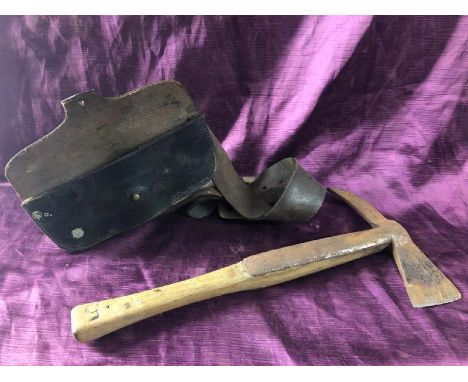 Early 20th century firemans axe with pouch, 40cm (l) x 20cm (w)  / All lots are located at The Barn, Hampstead Farm, Nr Henle