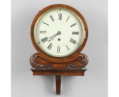 of small proportions, the 7 3/4" enamel dial with Roman numerals on a fusee driven 30 hour movement, upon a carved fixed brac