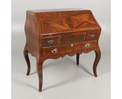 the parquetry fall front enclosing a pigeon hole interior with nine drawers and baize lined writing surface, over three drawe