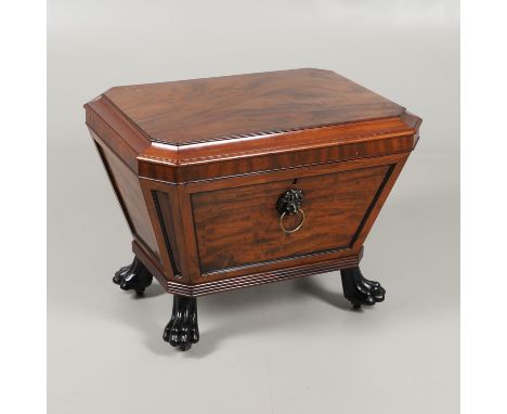 the octagonal lid enclosing the original lead compartmentalised liner, lion's mask ring handle to the front over a reeded bas