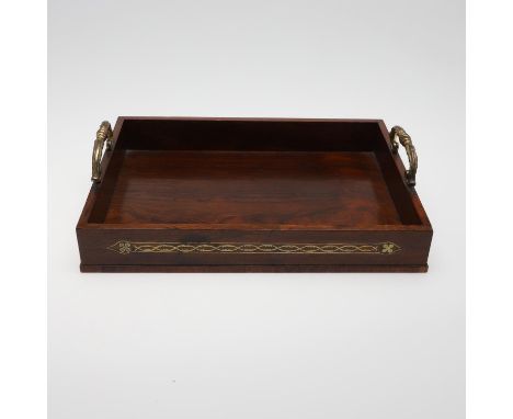 the sides and ends inlaid with a decorative brass interlacing pattern, the underside mounted with later red leather, width 39