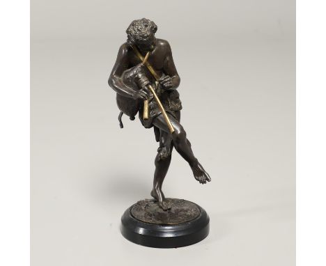 depicted dancing while playing gilded pipes, his body draped in a lion's head skin with vine detail to the base, upon an ebon