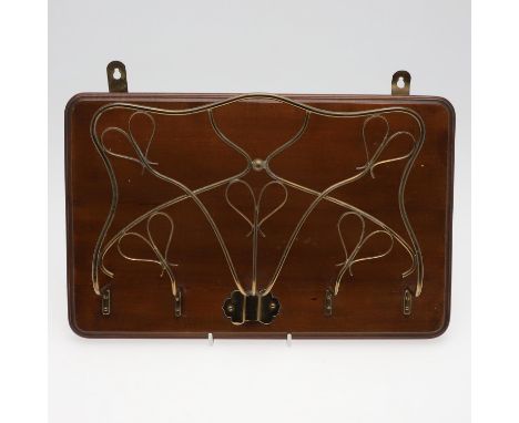 wall mounted, with ornate brass heart detail, width 40cm. *Condition: Light surface marks, needs a clean.
