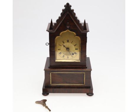 the 3" gilt brass engine-turned dial with Roman numerals on a brass single train fusee movement, the architectural case with 
