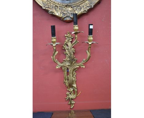 An Italian gilt metal three-branch wall light