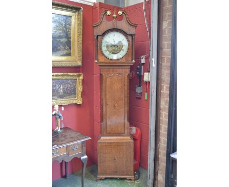 A George III oak and mahogany inlaid longcase clock, the round 33cm dial  painted with two boys playing shuttlecock, Roman ch