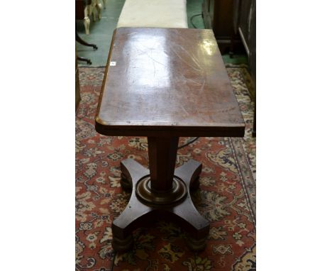 A George IV mahogany pedestal card table, folding top enclosing a inset baize lined playing surface, tapered panelled column,