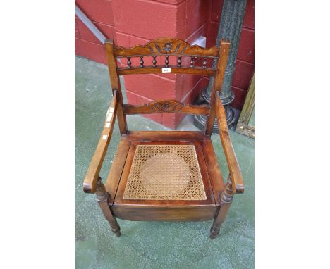An Edwardian commode chair